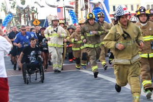 Mike racing alongside Orlando's first responders at the 2017 T2T race held at Crane's Roost, Altamonte Springs. Many rescue squads run in full gear.