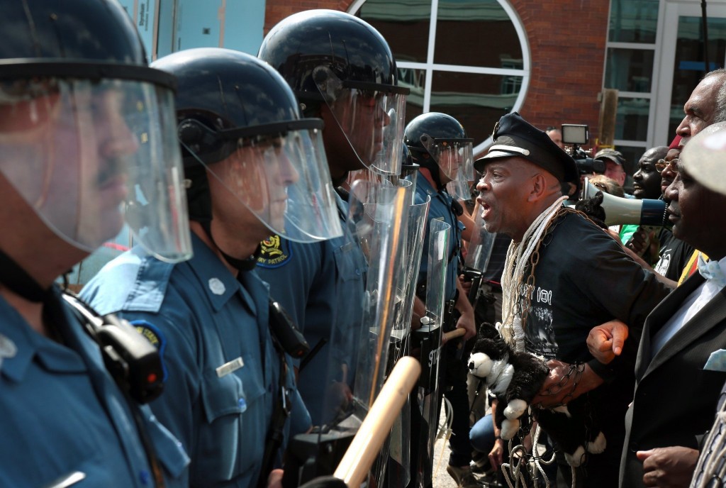 Protestors are met by Missouri State Highway Patrol officers/Robert Cohen/St. Louis Post-Dispatch/MCT